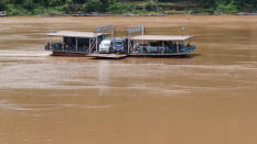 Ferry Across The Mekong